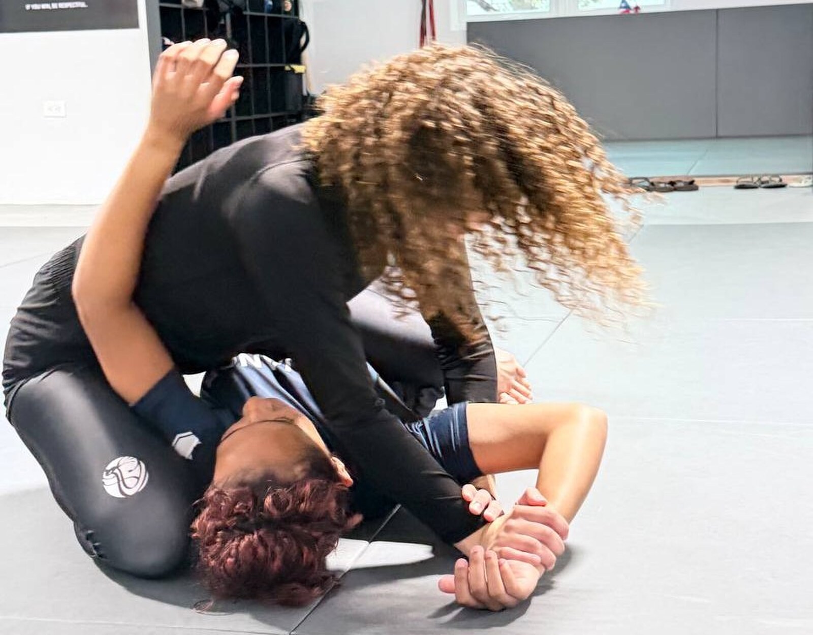 Two students training no-gi