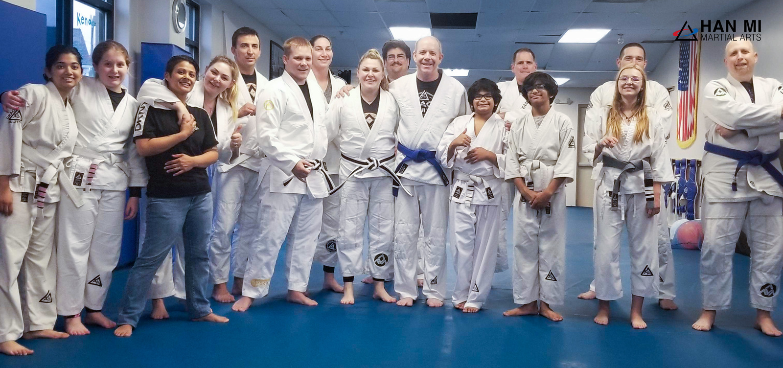 A group photo of Han Mi adult jiu-jitsu students