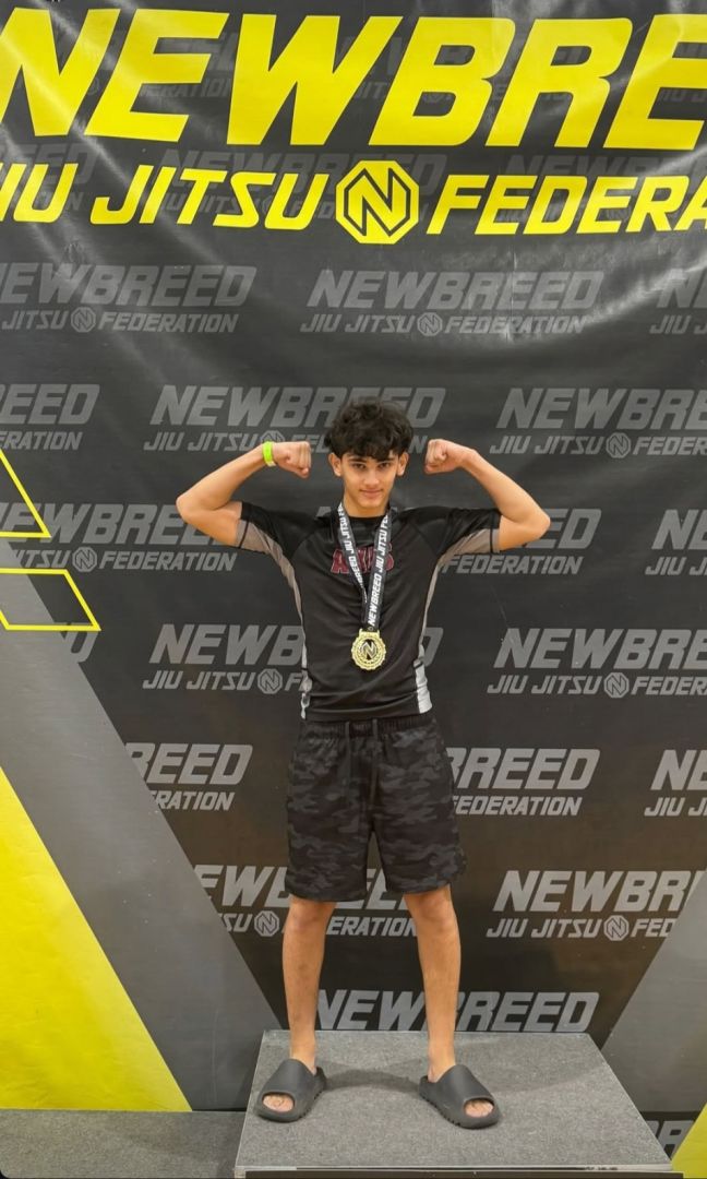 Axis teen with a gold medal at NewBreed