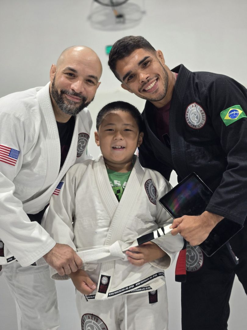 Coaches with a newly promoted kid
