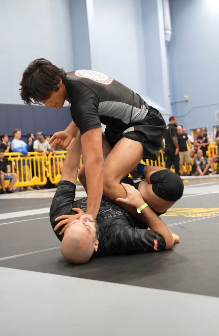 Axis kid competing in a no-gi match