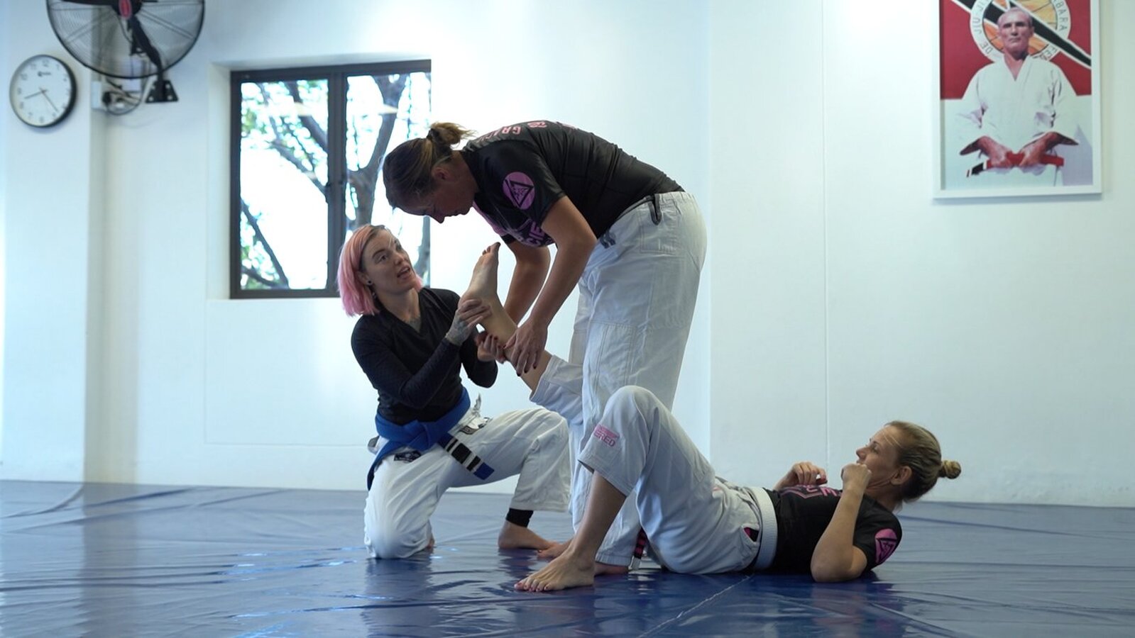 Adult women practising a Women Empowered technique on the mats at Gracie Jiu-Jitsu Fourways