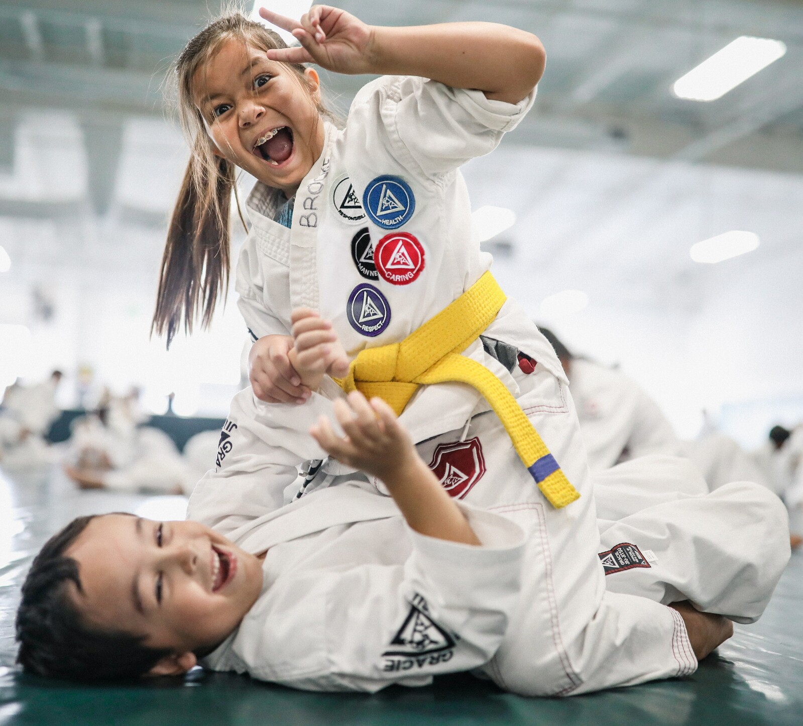 Young student practicing Gracie Jiu-Jitsu with an instructor in Schertz