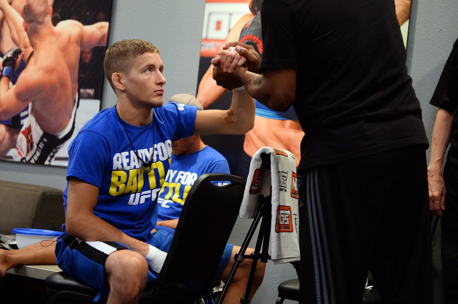 Chris Holdsworth having his hands wrapped backstage before a fight