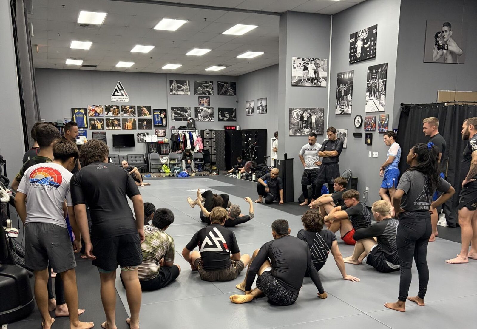 A packed no-gi class watching a technique demonstration in Orangevale
