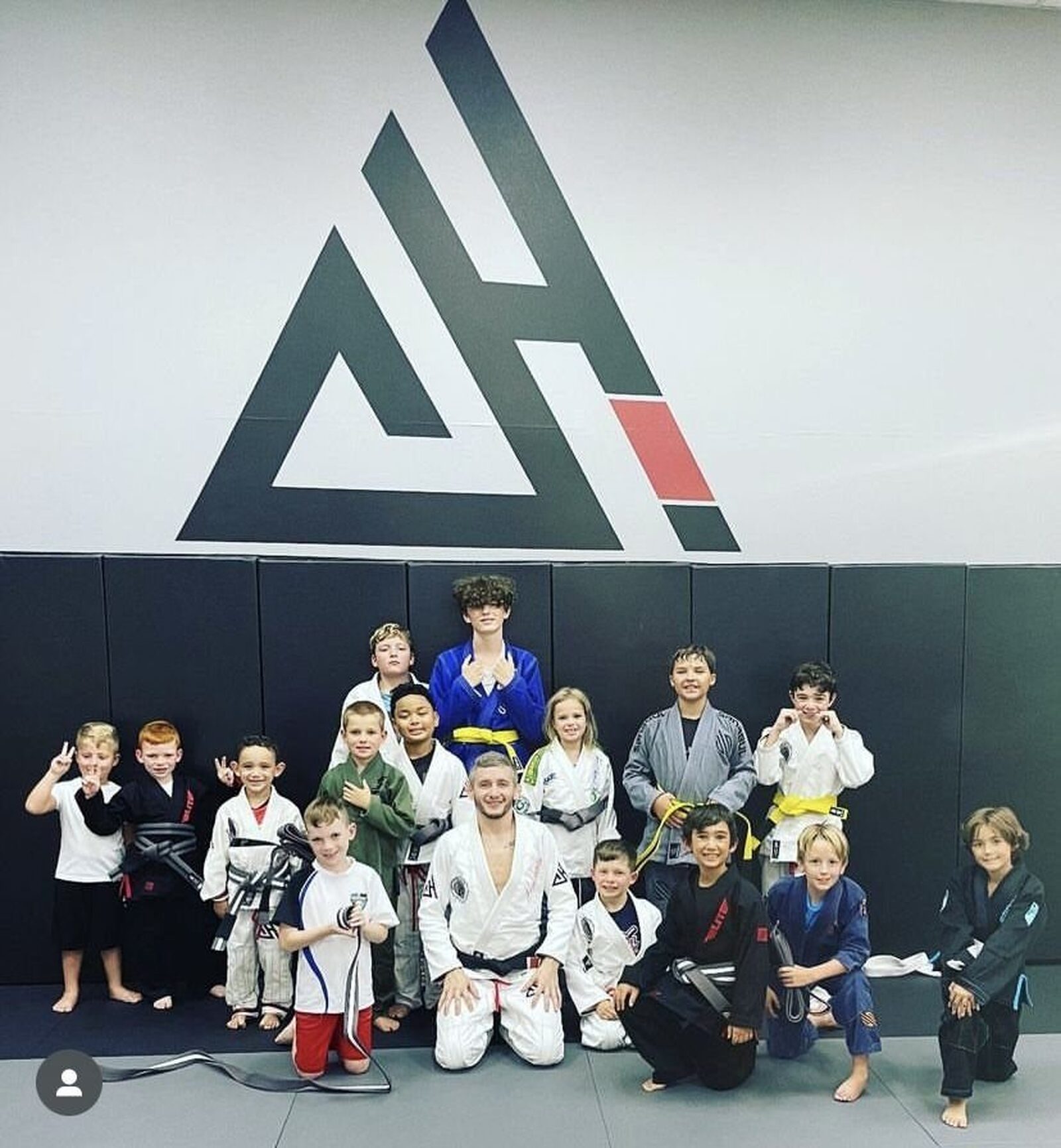 Kids class group photo with Coach Chris