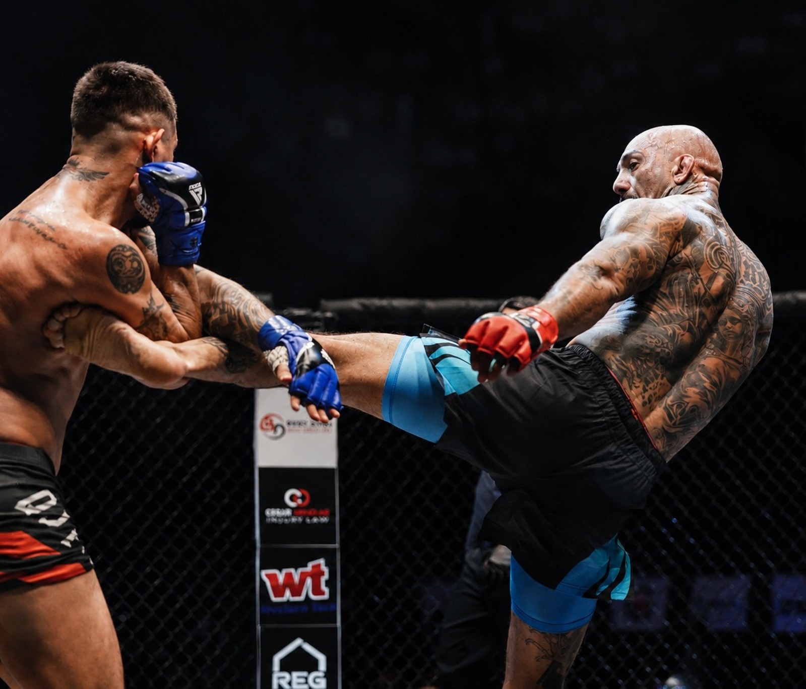 SVG MMA Academy: coach ricky, Head coach Ricky 'Savage' Maynez landing a head-height kick in the cage