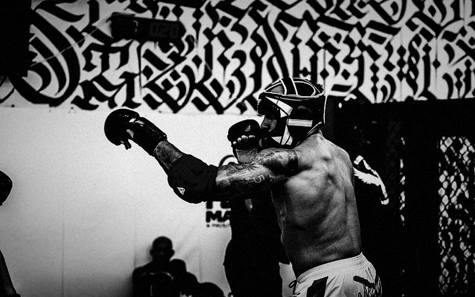 MMA sparring in the cage at SVG MMA Academy