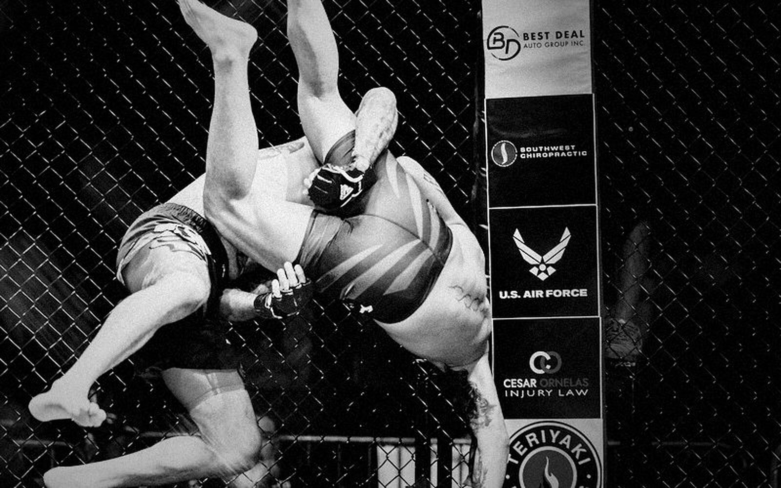 Cage wrestling takedown battle by an SVG MMA Academy fighter