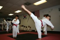 students working on kick in class